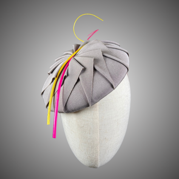 Grey Ribbon Origami Cockade hat design with cerise pink and yellow quills.
