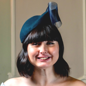 Navy felt perching hat with bow detail